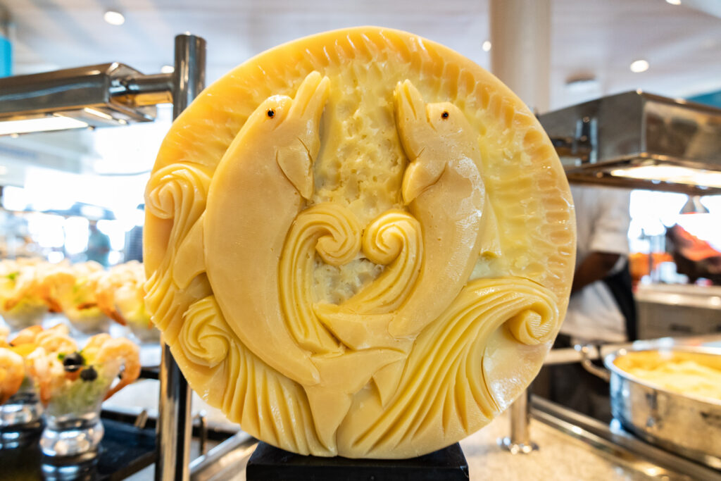 Icon of the Seas Windjammer First Lunch Cheese Wheel